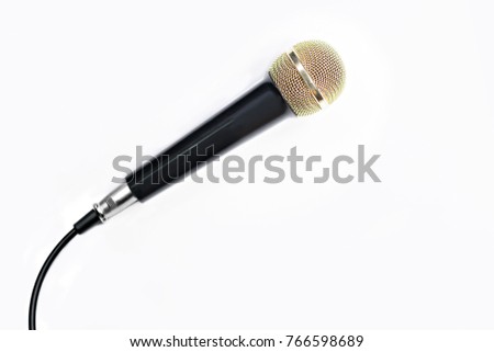 Golden microphone on isolated white background.