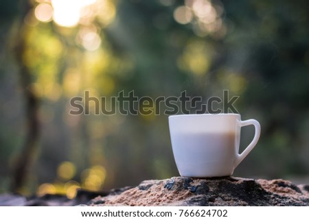 A cup of coffee on the rock,
