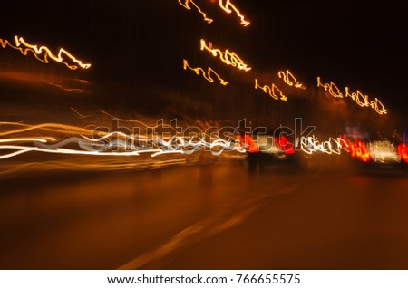 beautiful long lines of blurry headlights at night  