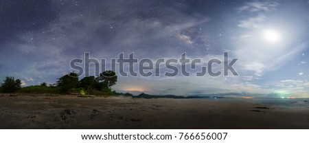panorama of cloudy night sky with Milkyway Galaxy. Image contain soft focus and blur due to long expose. Image also contain noise and grains due to high ISO.