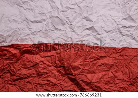 Grunge crumpled Poland paper flag background.