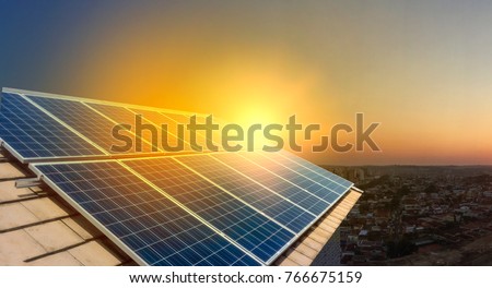 Solar Panel Photovoltaic installation on a Roof, alternative electricity source - Concept Image of Sustainable Resources Royalty-Free Stock Photo #766675159