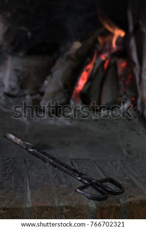 Close up shoot of burning firewood in the fireplace.