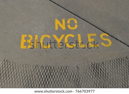 Painted No bicycle sign