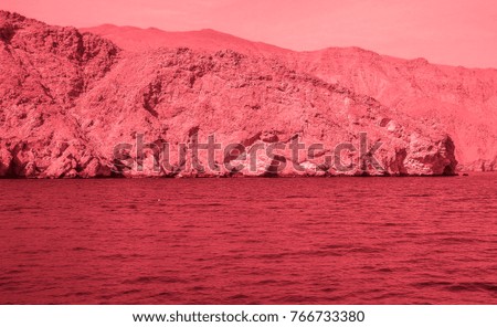 Bloody colored Sea of Oman. Middle Ages style photo. Arabian peninsula