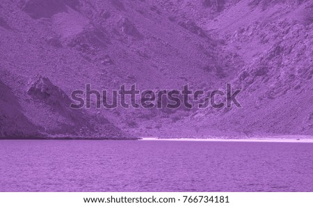 Purple colored Sea of Oman artistic view . Middle Ages style photo. Arabian peninsula