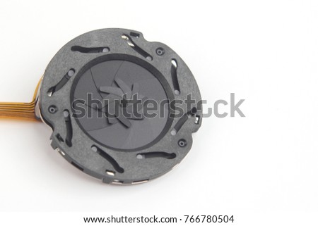 disassembled part of the aperture of the camera lens