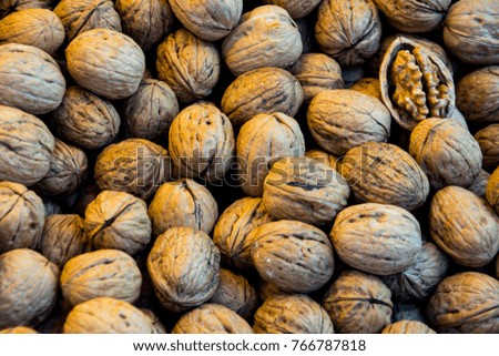 closeup shoot of the open and close walnuts at market