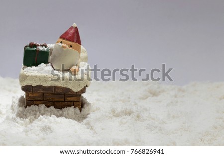 Santa Claus doll Made of plaster On the snow made up.