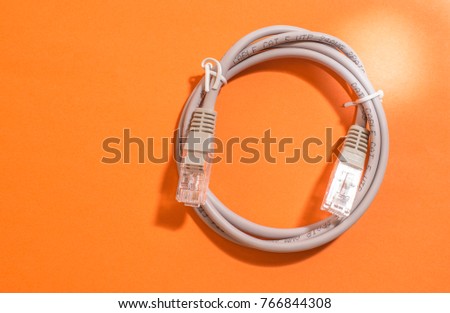 USB cable on bright colour background