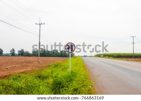 A traffic warning sign "Do not overtake"