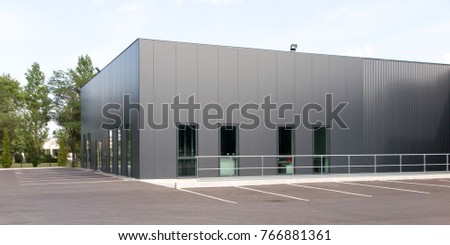 grey and green building for industry or business  Royalty-Free Stock Photo #766881361