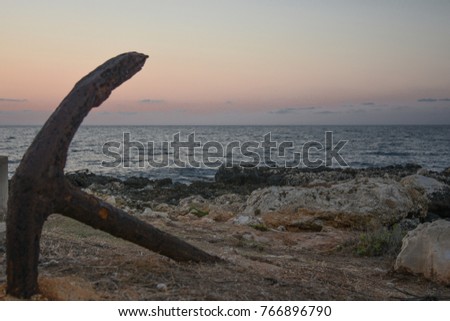 An old anchor staying near the coast