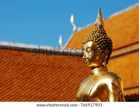 Stone statue of Buddha, outside the temple. Chiang Mai, Thailand