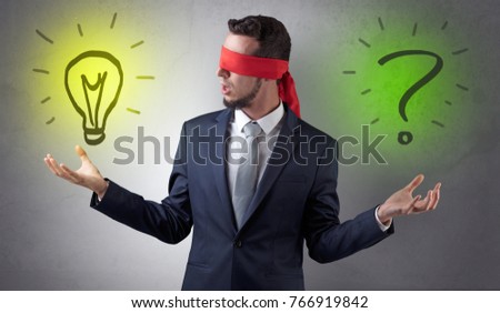 Covered eye businessman with bulb and question sign symbols around