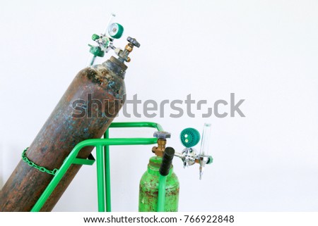 Equipment medical Oxygen tank and pipeline meter control pressure oxygen gas for care a patient respiratory disease and emergency CPR, on white   isolate background selective focus.