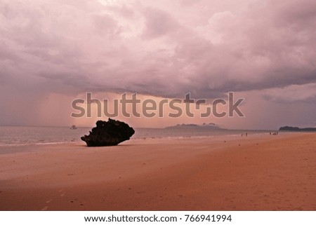 on the sea beach with rainstorm   