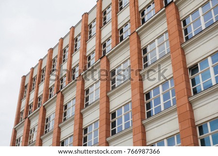 orange and white facaded apartment building