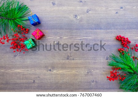 Christmas composition. Christmas gift on wooden background. Flat lay, top view.