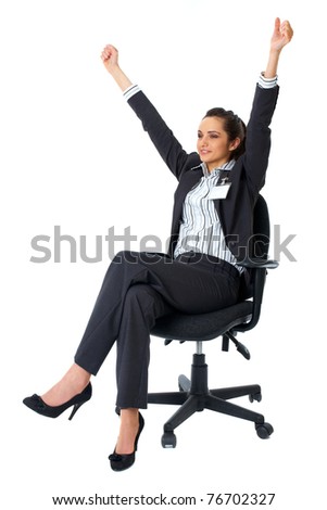 happy excited young businesswoman, sits in office chair, isolated on white