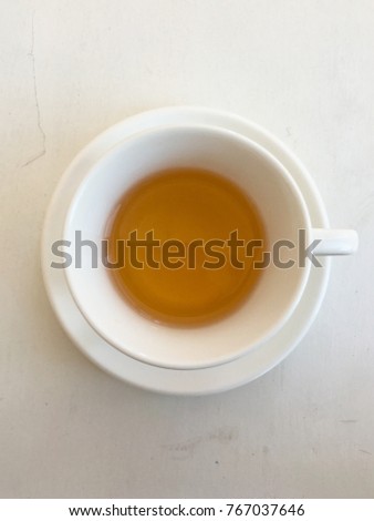 Tea in the white cup. Royalty-Free Stock Photo #767037646