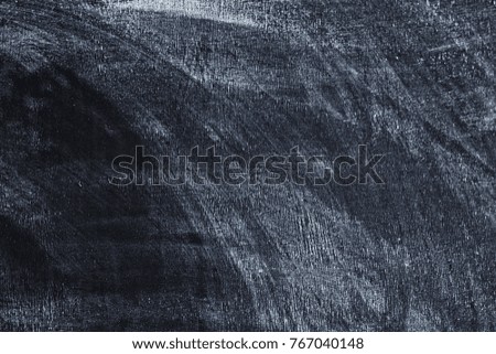 Texture of dark chalkboard. Black vintage background.
