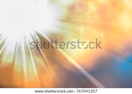 Abstract background of lens flares with light beam on left top corner