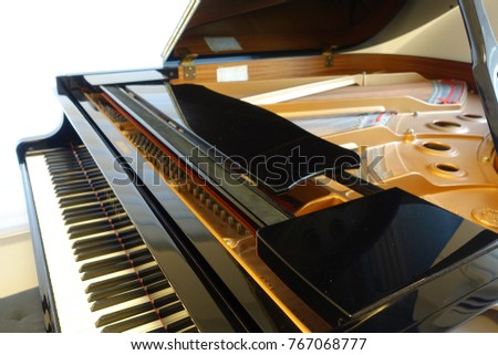 Grand piano, with cover open