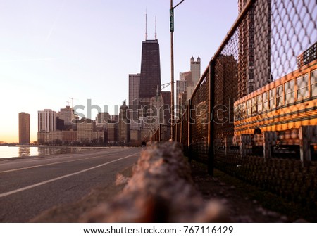 Traffic flies by on Lake Shore Dr. in Chicago during the morning commute. The skyline is in the background. 