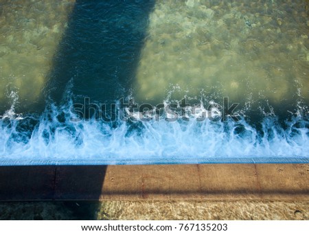 Water background texture. waterfall. granitic
