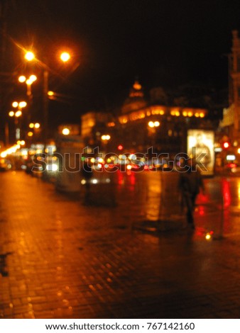  blurred wet night city after rain