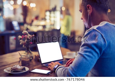 Man working in cafe