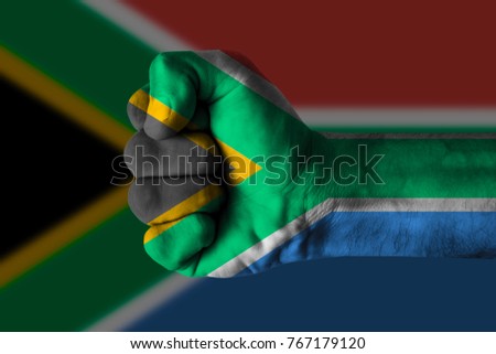Fist painted in colors of Afrique du Sud flag, fist flag, country of Afrique du Sud