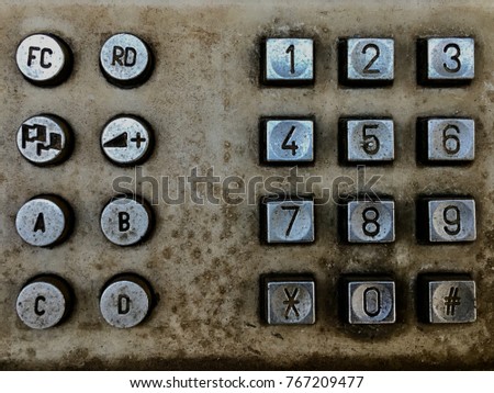 Number and sign on the old telephone. Royalty-Free Stock Photo #767209477