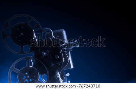 Movie projector on a dark background / high contrast image