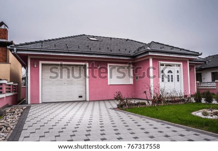 House. Landscape of modern pink house. 