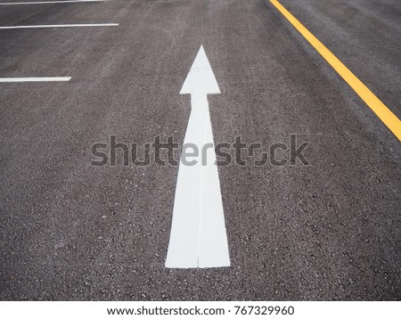 White arrows on the street         