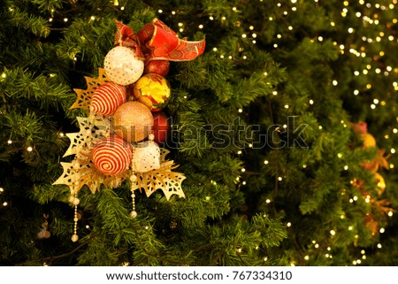 Christmas tree background with decoration and light bokeh