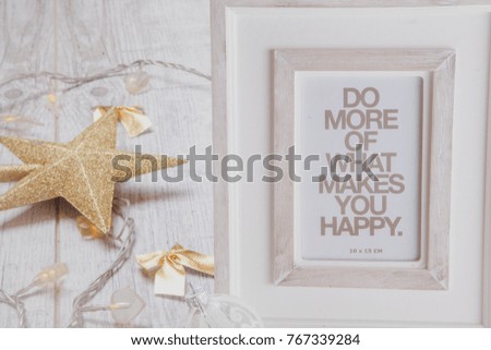 Christmas frame with the inscription do more of what makes you happy white with gold elements