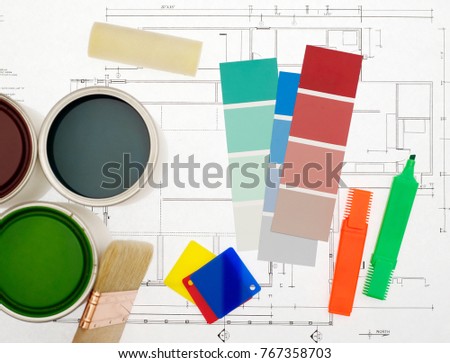 Painting tools, blueprints and color swatches