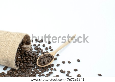 Coffee beans in white backed cloth bag, pictures for background and decoration in coffee shop