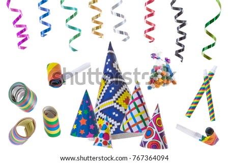 festive image with rolls of curly ribons on ltop efts corner and multi coloured party favors on the gound on white background