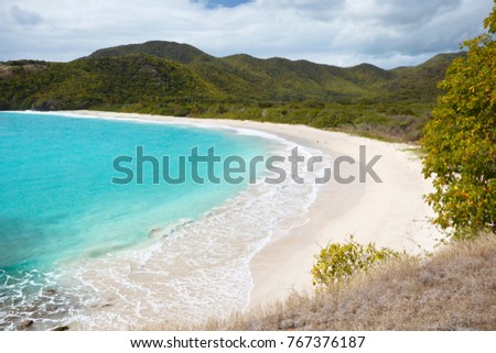 The pristine and hard to reach beach in the Rendezvous Bay in Antigua. Royalty-Free Stock Photo #767376187