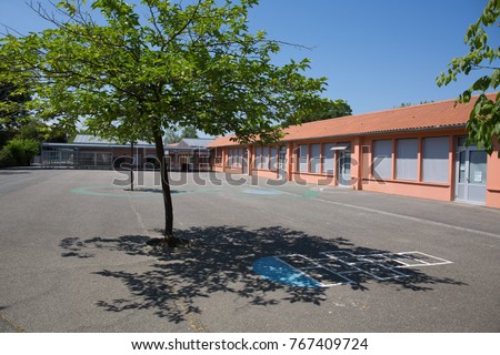 Red School Building Royalty-Free Stock Photo #767409724