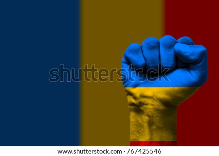 Fist painted in colors of Chad flag, fist flag, country of Chad