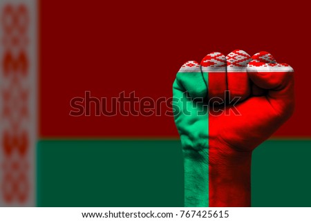Fist painted in colors of Belarus flag, fist flag, country of Belarus