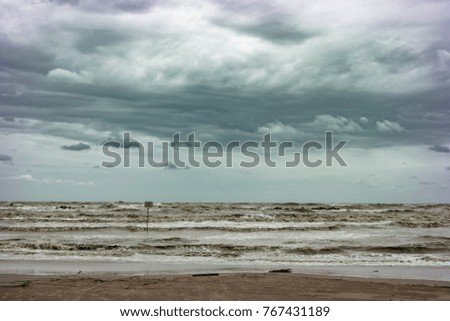 A coming storm on a beach