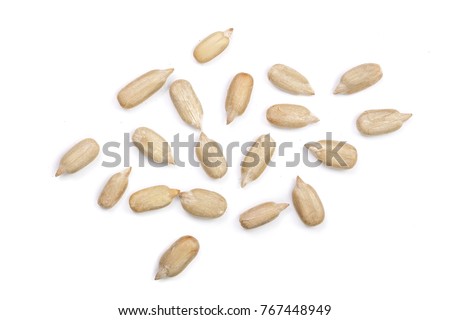 Peeled Sunflower seeds isolated on white background. Top view Royalty-Free Stock Photo #767448949