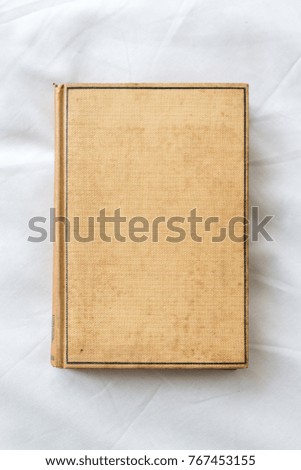 closed old brown book hardcover