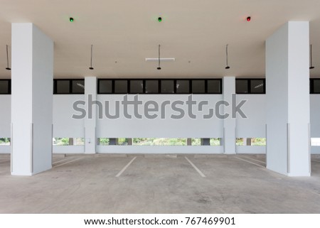 Modern empty parking garage interior in apartment or in supermarket